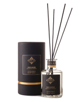 Raumduft Oud Nude von Relax-Cottage mit Stäbchen und schwarzer Zylinderverpackung in schwarz - gold